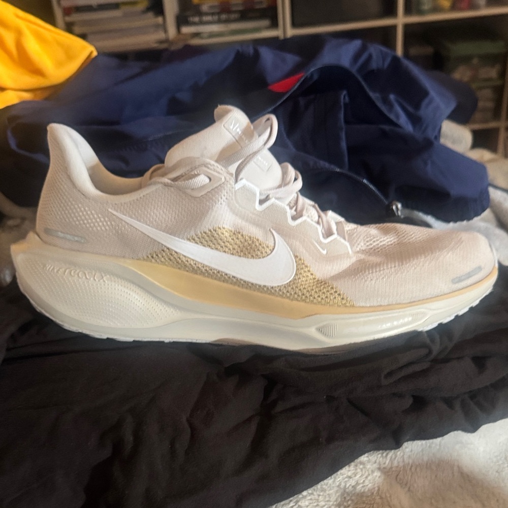 Nike. Cream or light khaki color.  Worn twice. Very comfortable.